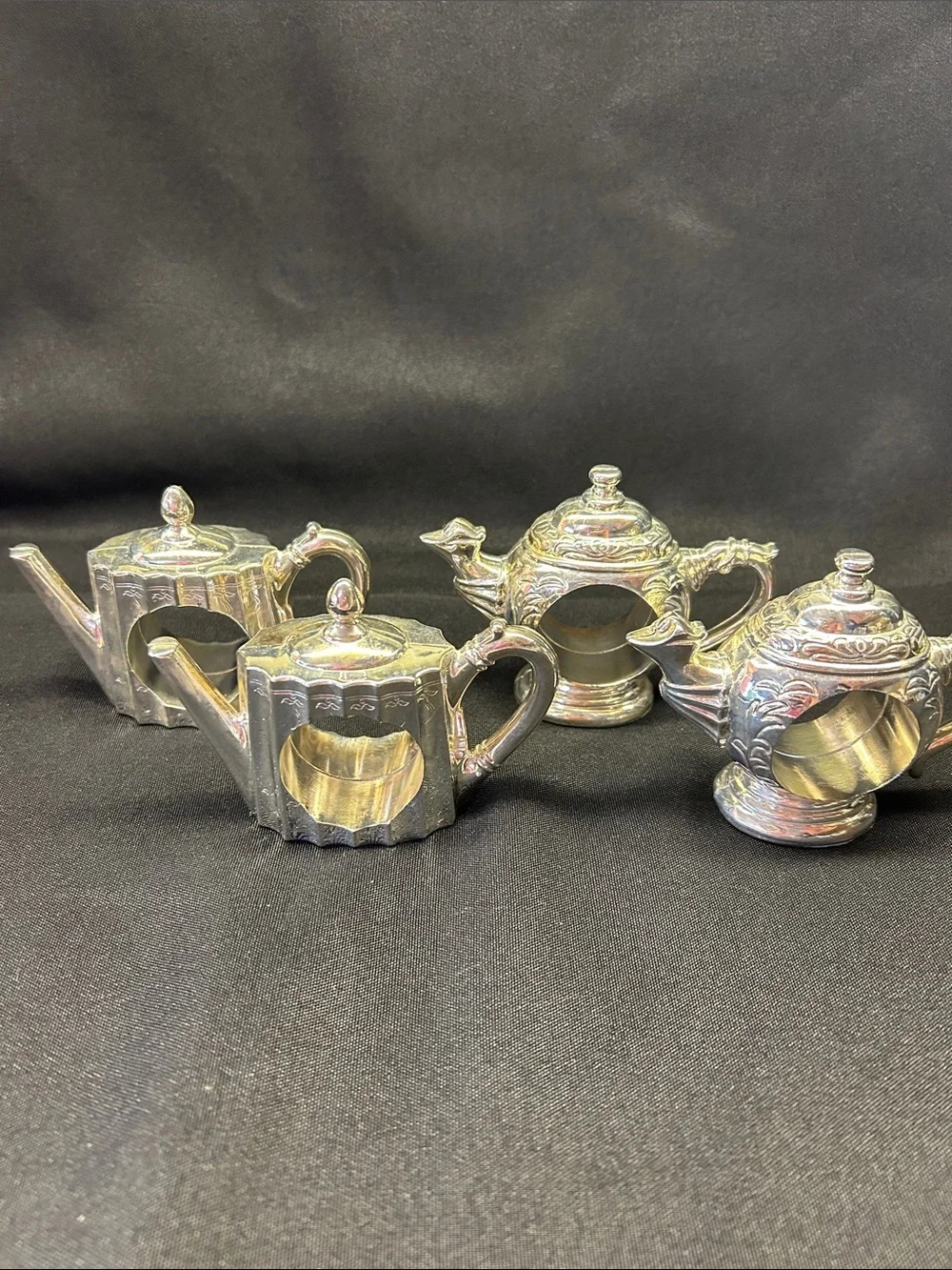 Vintage Godinger silver-plated teapot napkin rings. Set of 4